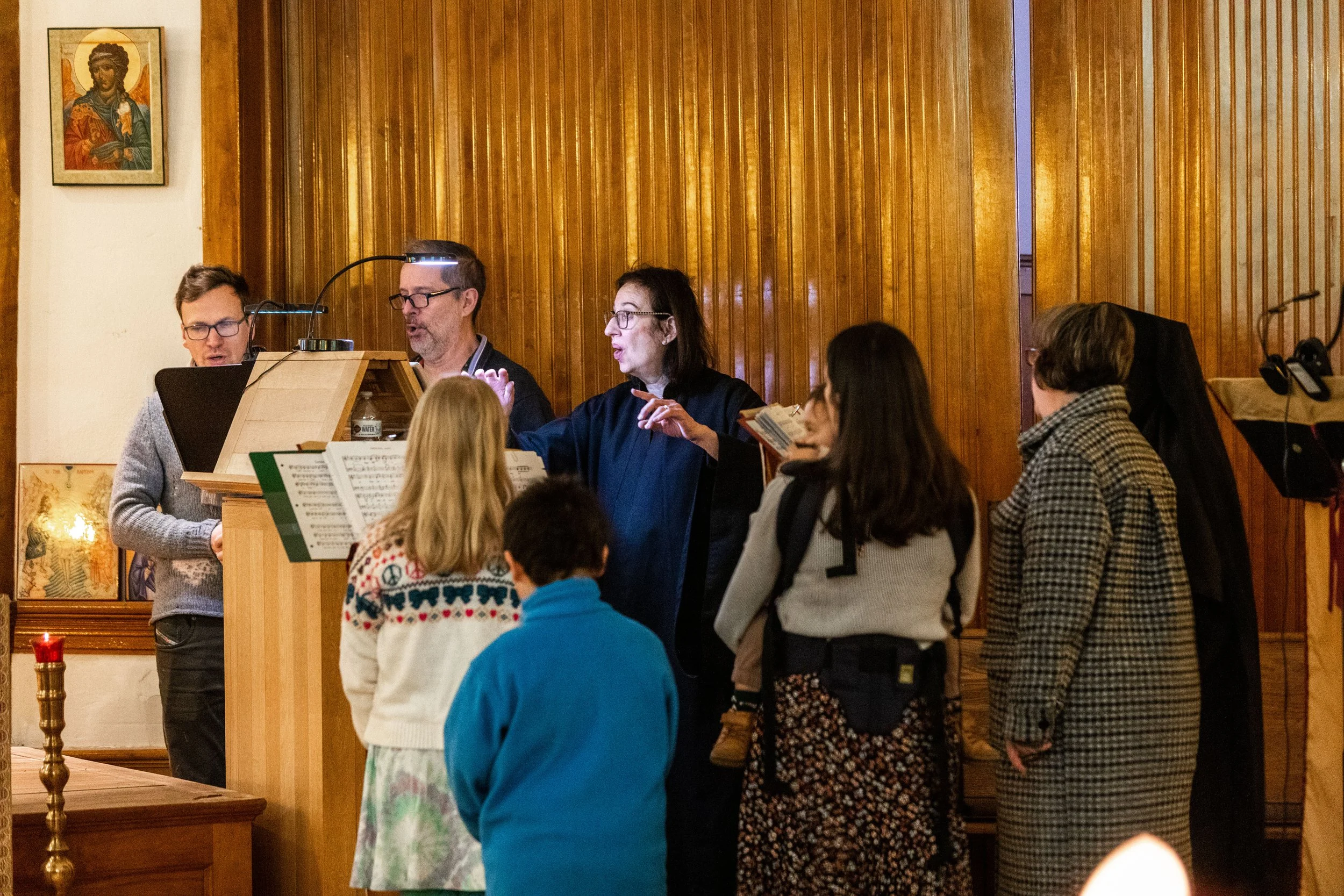 Dr. Jessica Suchy-Pilalis directing the chanters at St. Olympia Parish