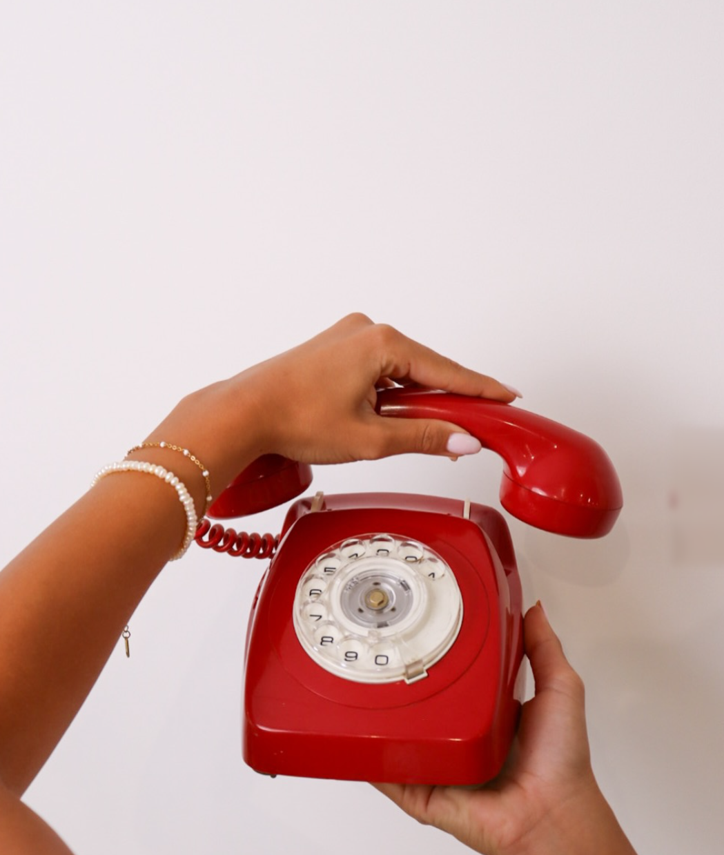 Red rotary phone at MUSE