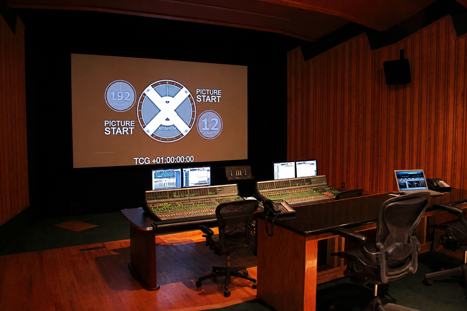 Screen-centered Los Angeles mix room with professional console and monitoring.