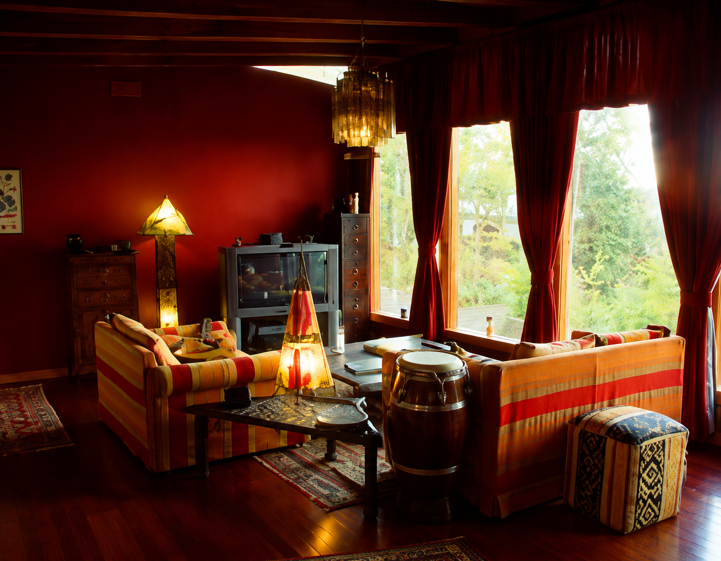 Warm wood-beamed living room with canyon views in a home with a private recording studio.