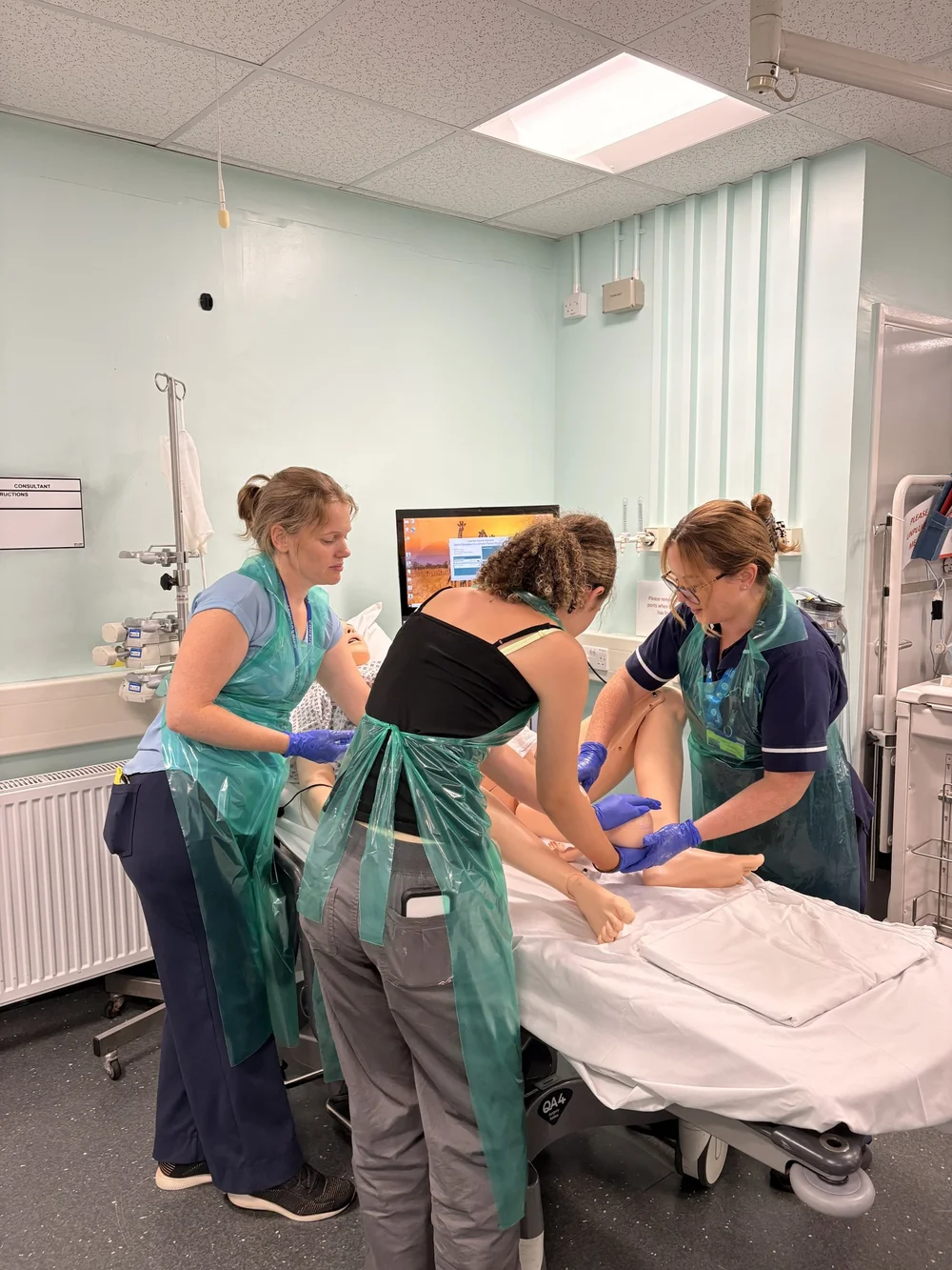 Medicine participants with a clinical educator on a simulation ward