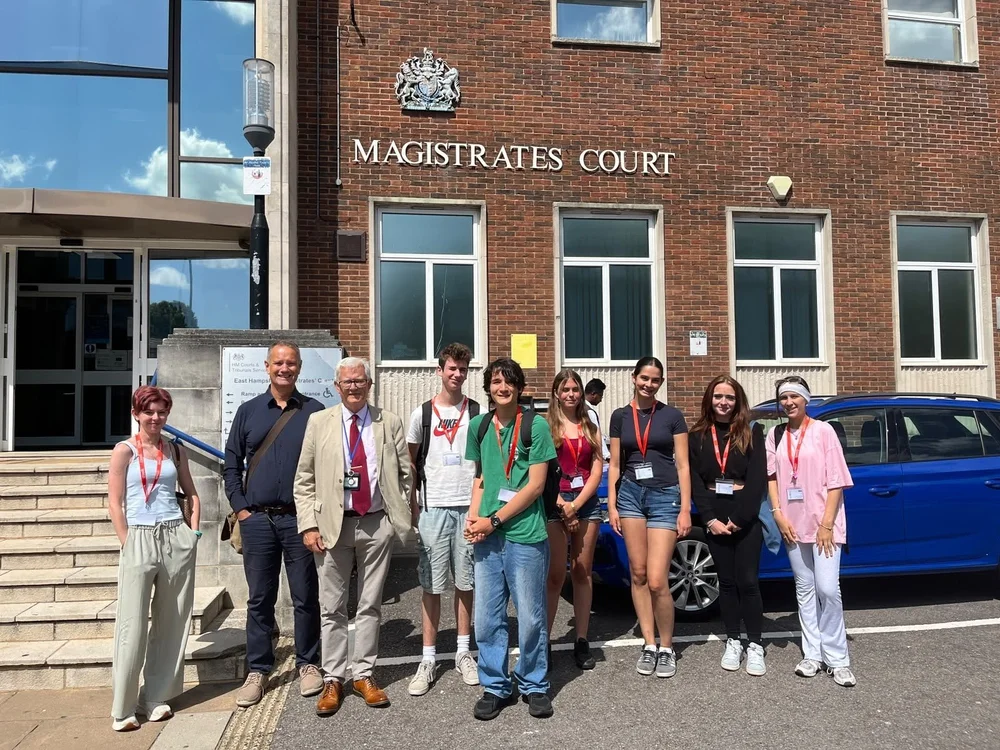 Law participants with legal professionals outside a magistrates court