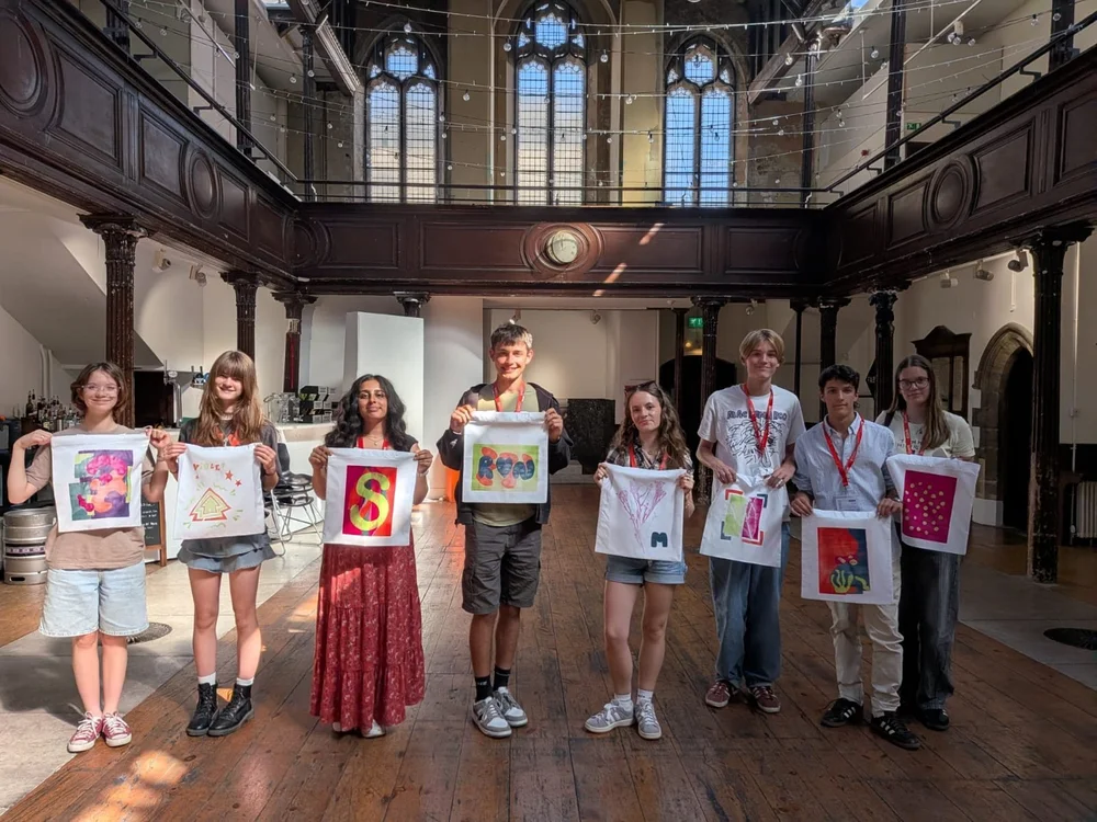 Arts participants with their finished work