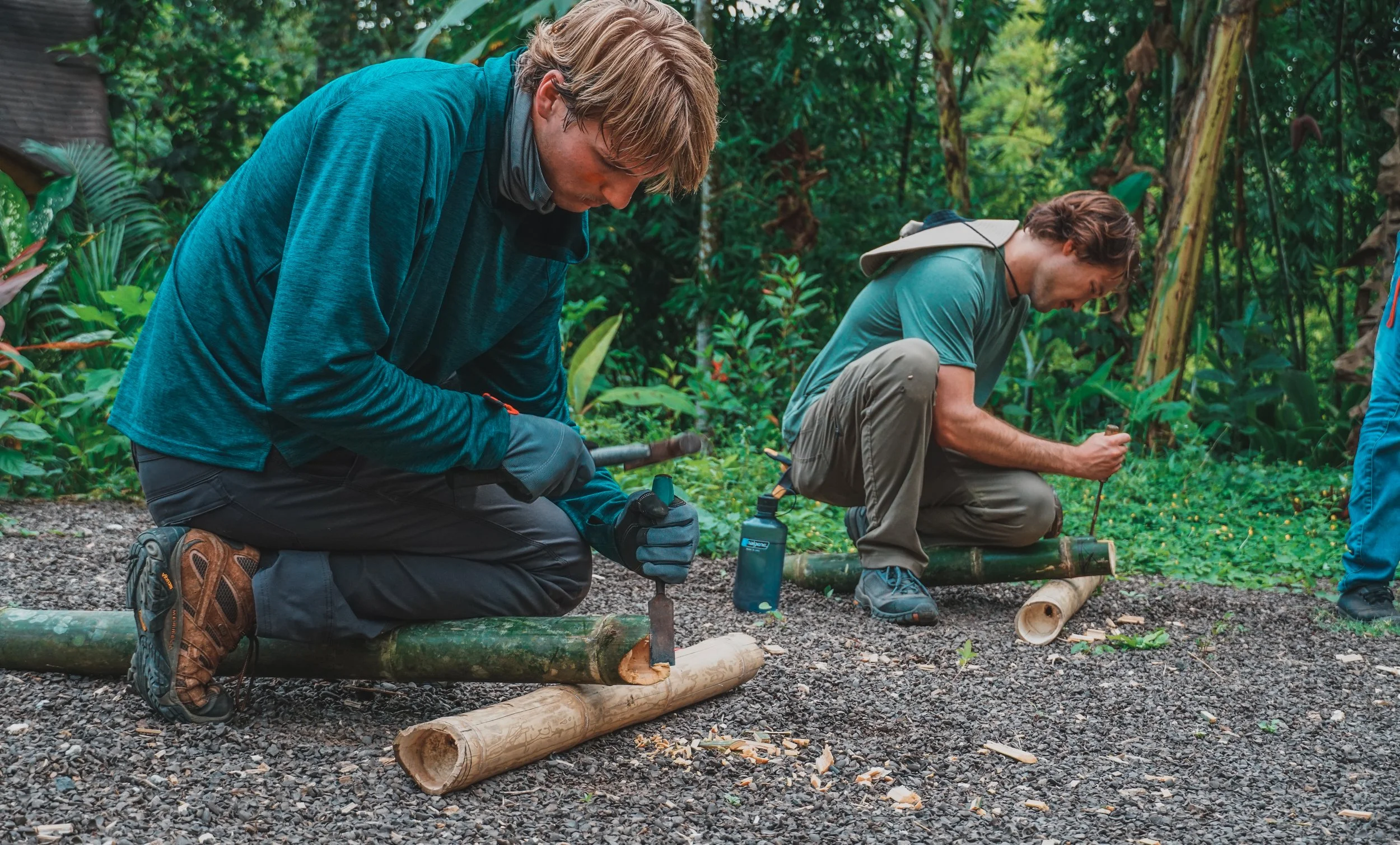 Participants completing hands-on work during an RFI bamboo architecture program.
