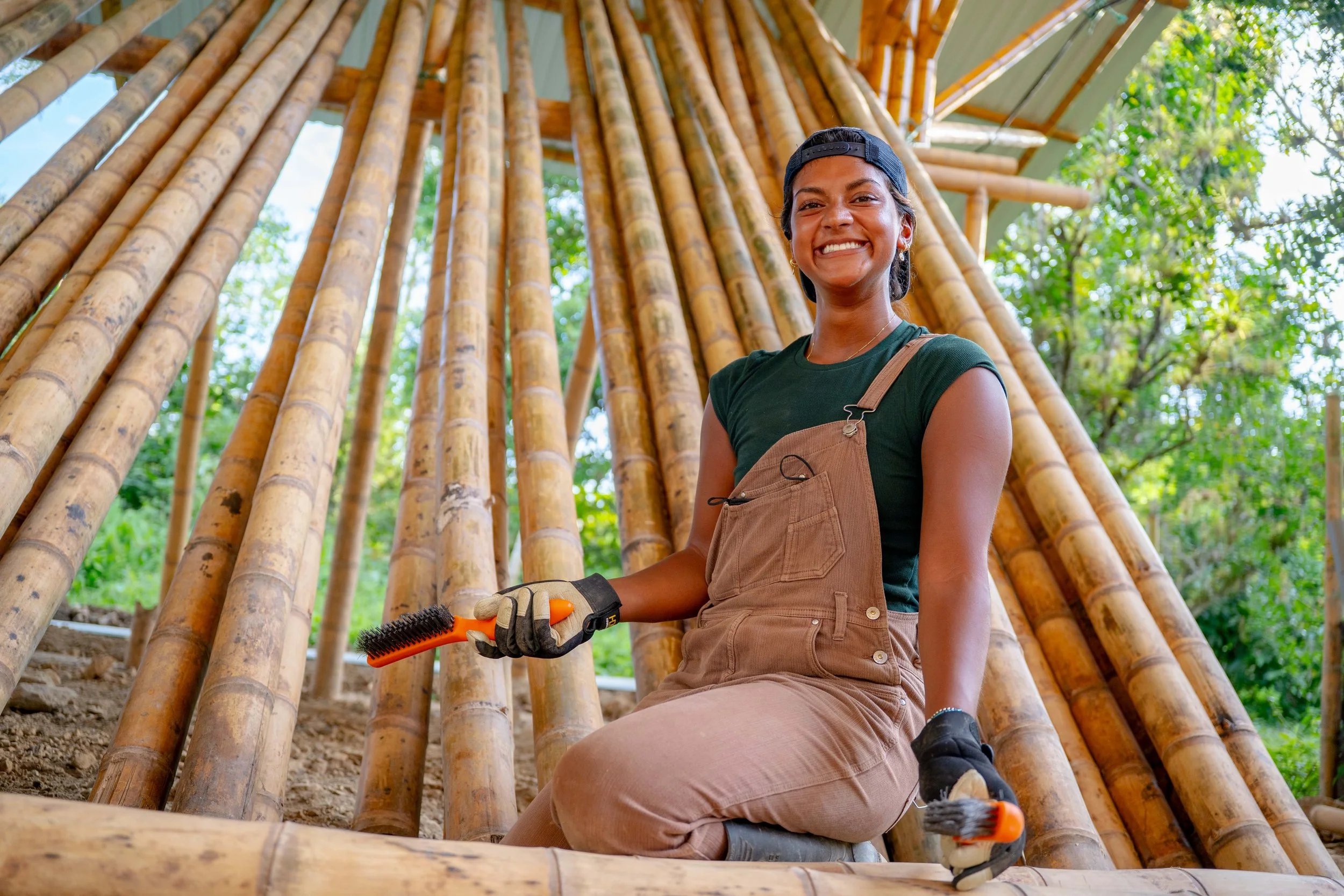 Locally processed bamboo components prepared for structural testing and construction.