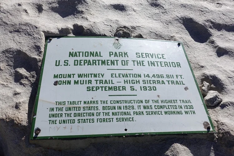 A National Park Service plaque on Mount Whitney commemorates the trail's completion in 1930.