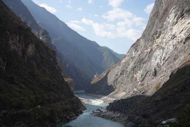 The Jinsha River runs between the steep walls of Tiger Leaping Gorge.