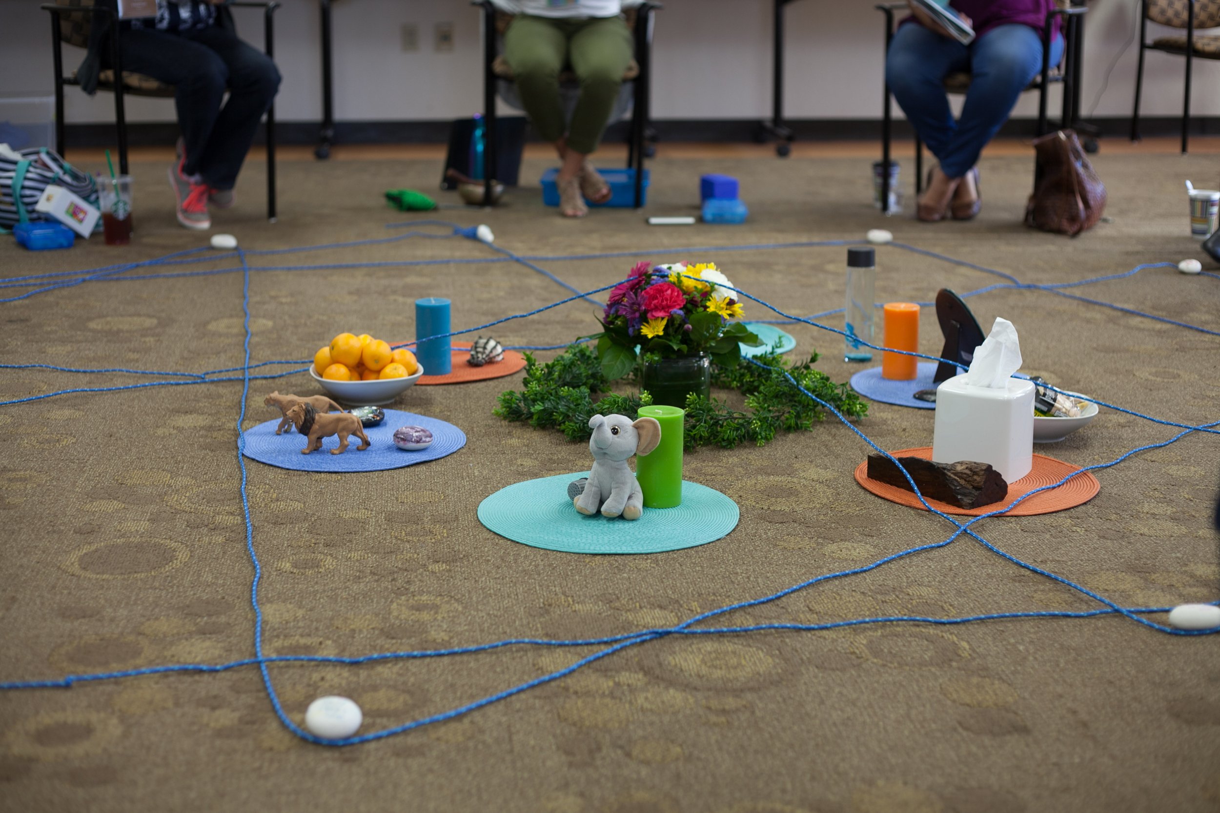 A restorative circle centerpiece with objects