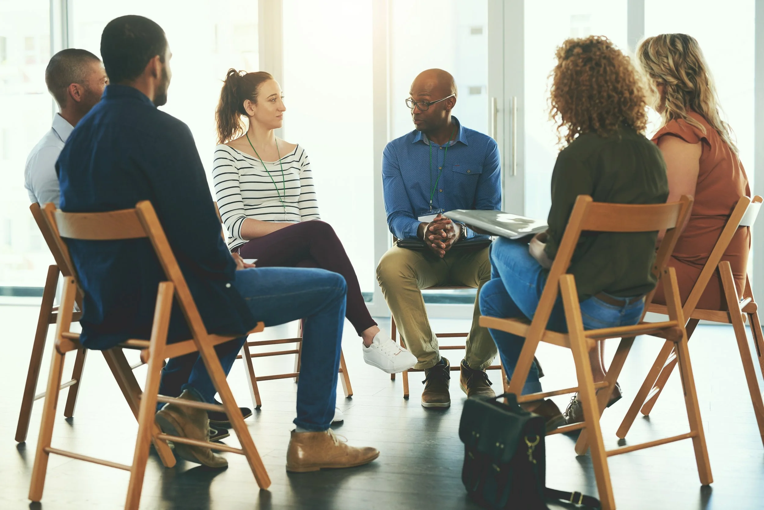 Adults participating in a guided relationship circle