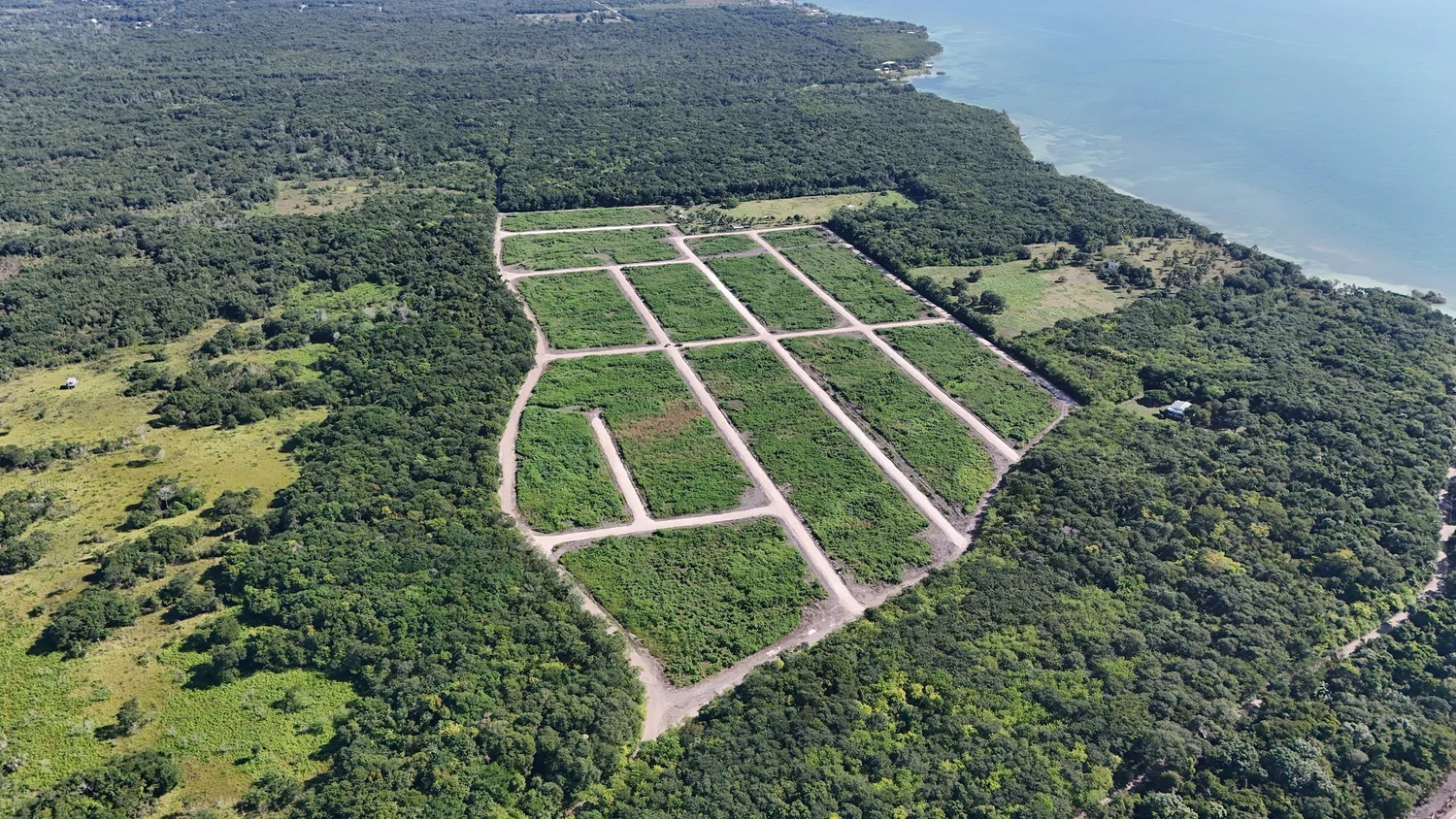 Drone view of Phase 2 roads and lots with the bay in the distance