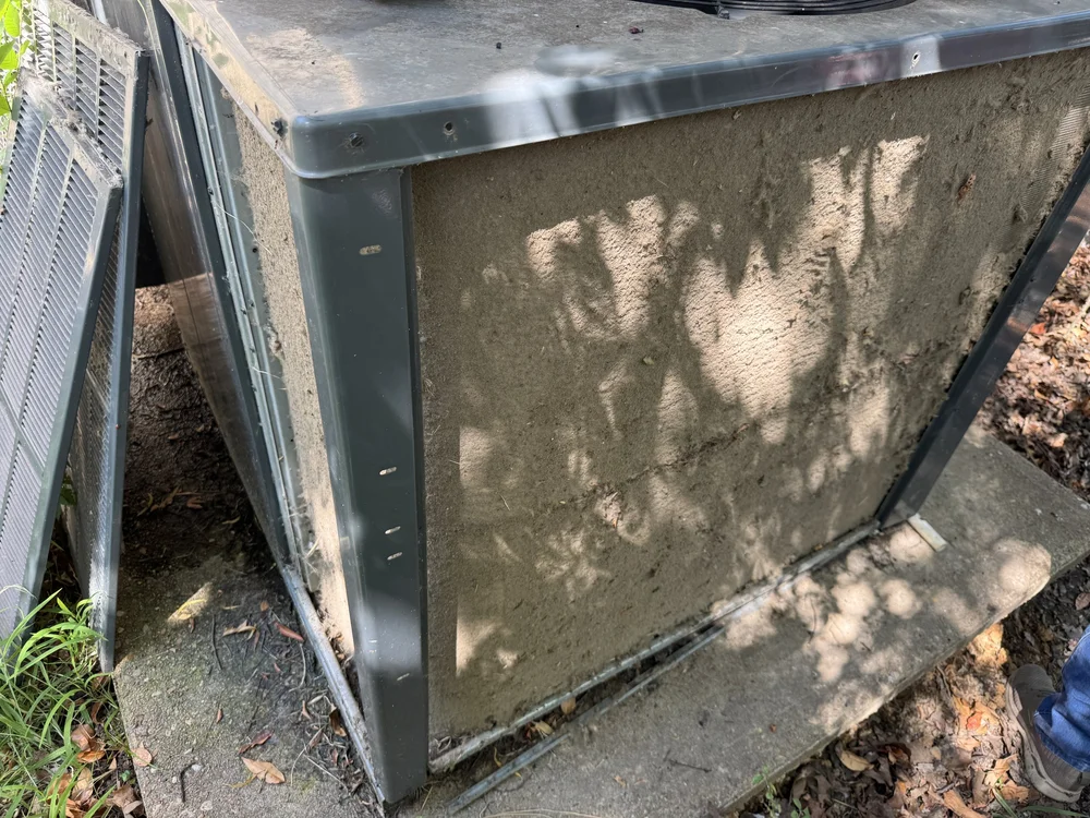 Dirt-packed condenser coil found on a Clark HVAC maintenance call in Spiro, OK