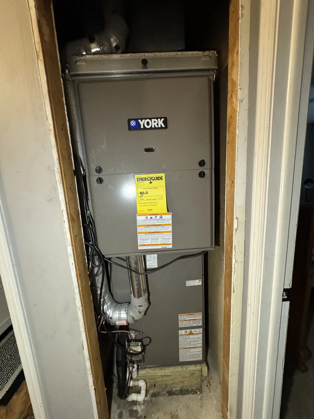 York gas furnace installed in a hall closet by Clark HVAC in Fort Smith, AR