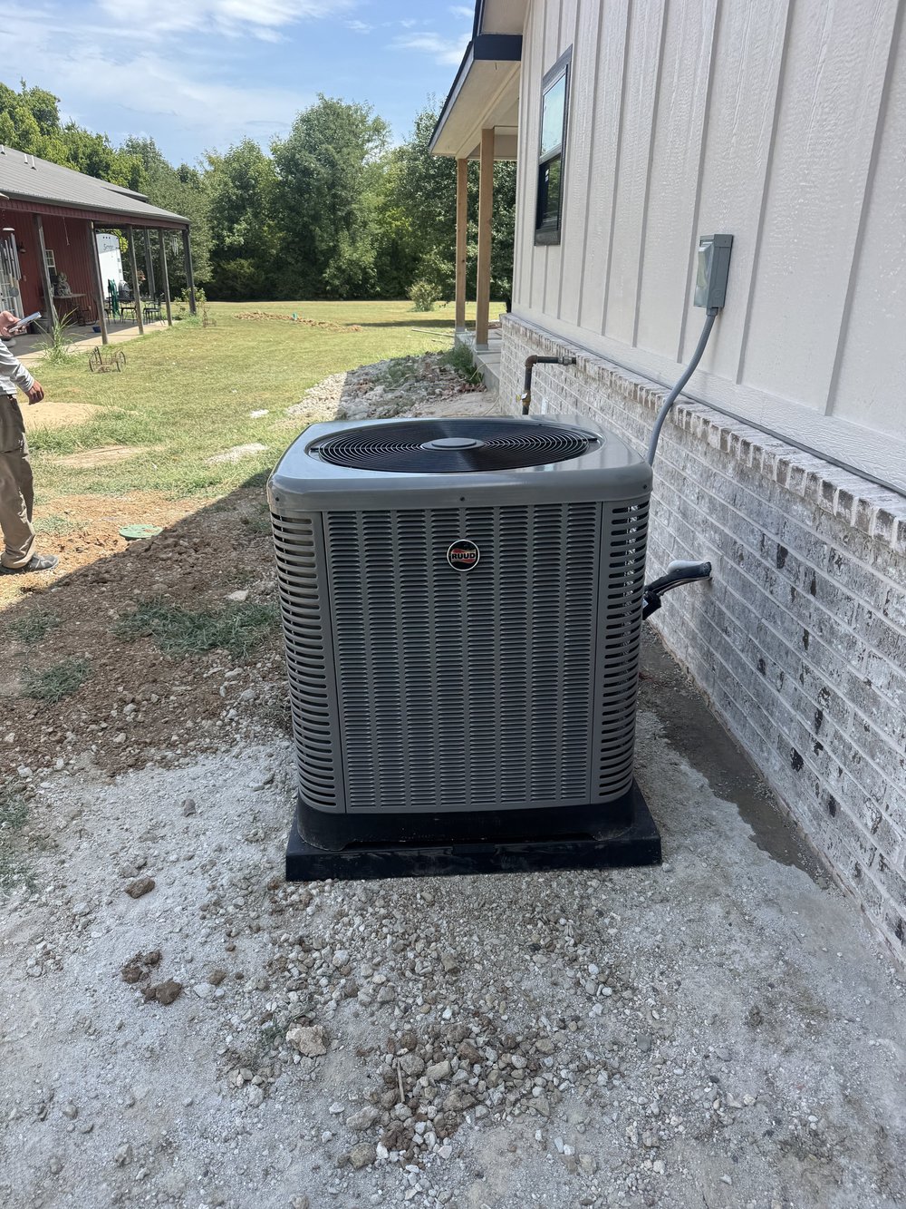 New Ruud AC condenser installed by Clark HVAC at a new-construction home near Spiro, OK