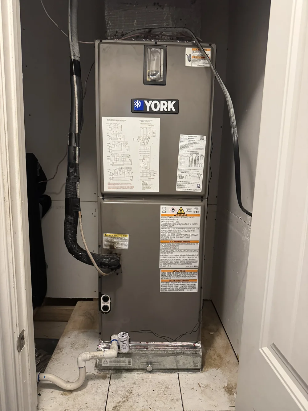York air handler installed in a hall closet at a home in Cameron, OK, by Clark HVAC