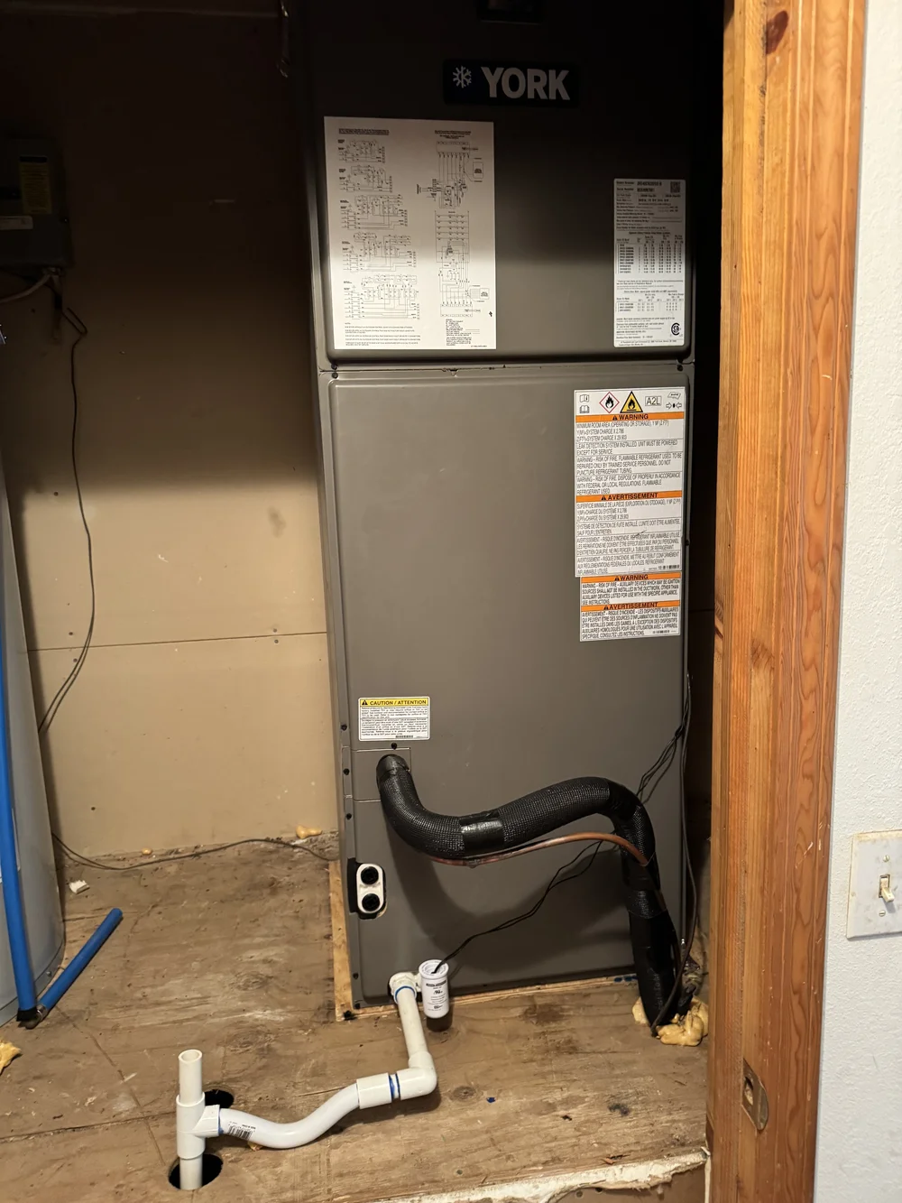York R-454B air handler set in a utility closet by Clark HVAC at a home near Keota, OK