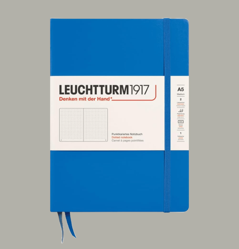 A Leuchtturm notebook with a sky blue cover