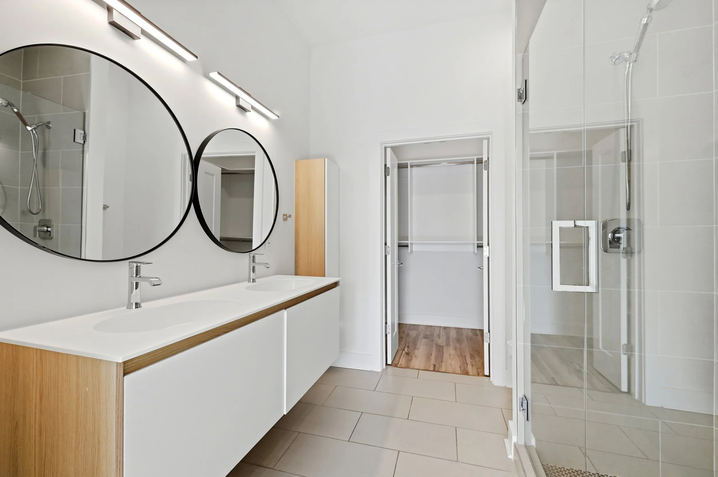 Primary bathroom with walk-in shower at Moreland Walk #202