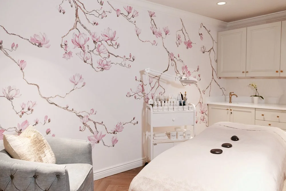 Delamar Spa serene treatment room with massage table and calming ambiance