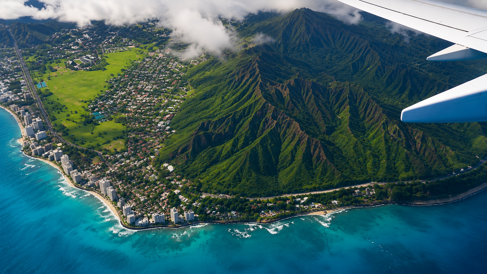 Aerial view of Diamond Head and Waikiki from an airplane window
