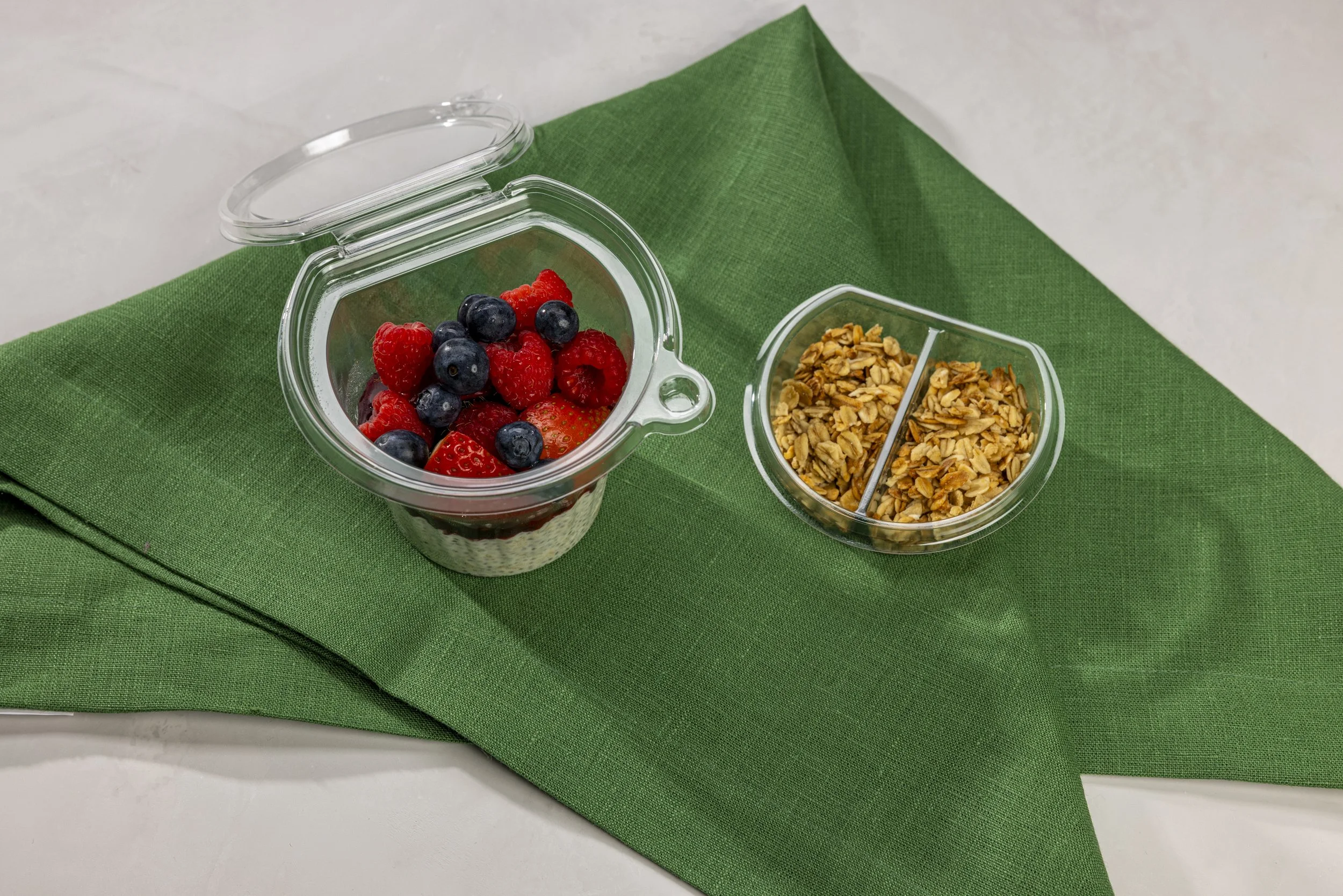Coconut overnight oats with chia seeds, berries, and gluten-free granola