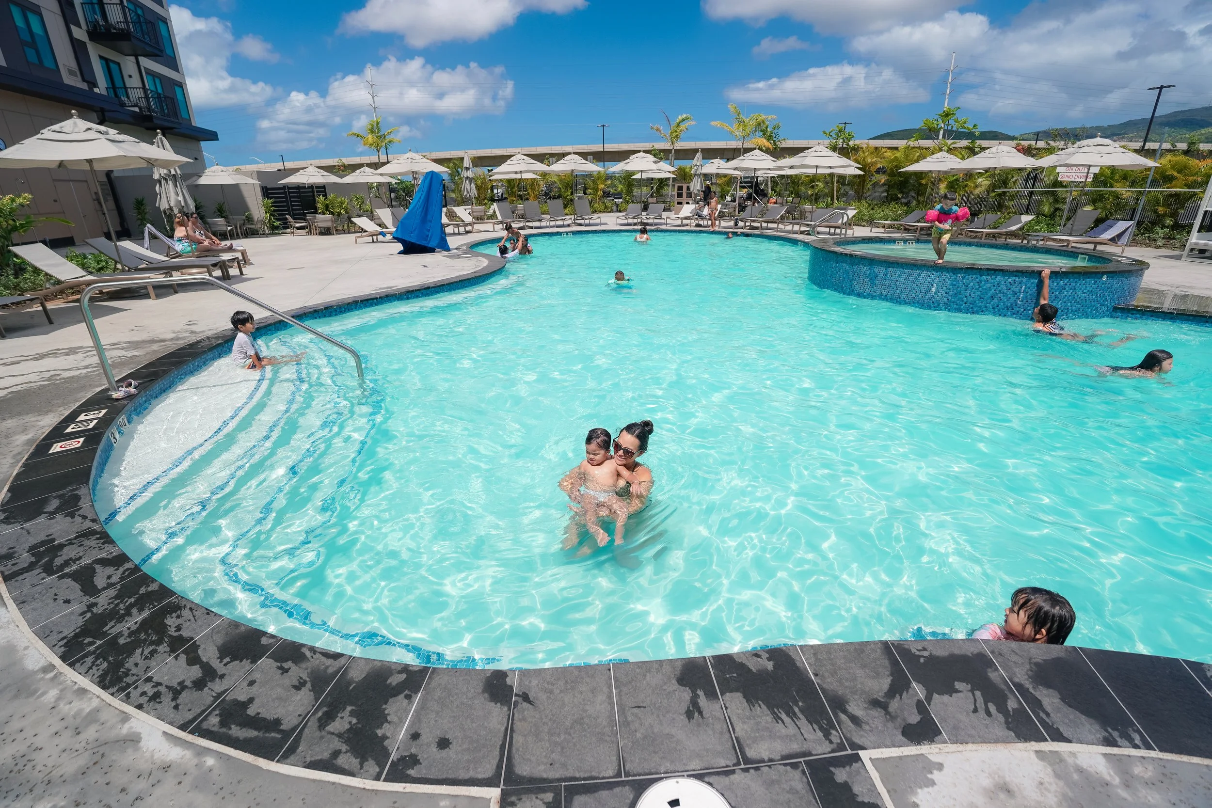 Pool deck and loungers at the new Hyatt Hoʻopili