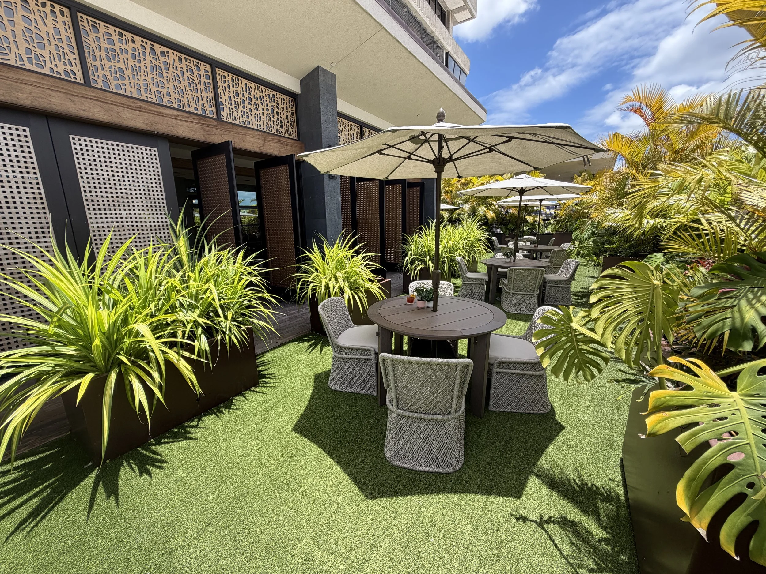 Interior of The Plumeria Loft premium lounge at Daniel K. Inouye International Airport in Honolulu