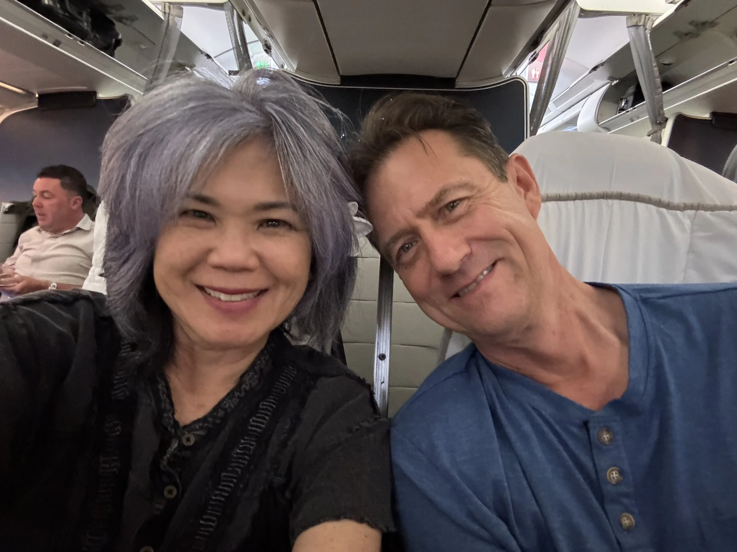 Photo 1 — Replace alt text with: cabin/destination, e.g. 'ANA First Class The Suite, HNL → NRT'