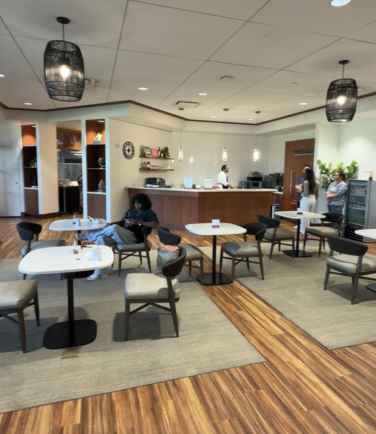Outdoor lanai seating at The Plumeria Loft lounge at HNL