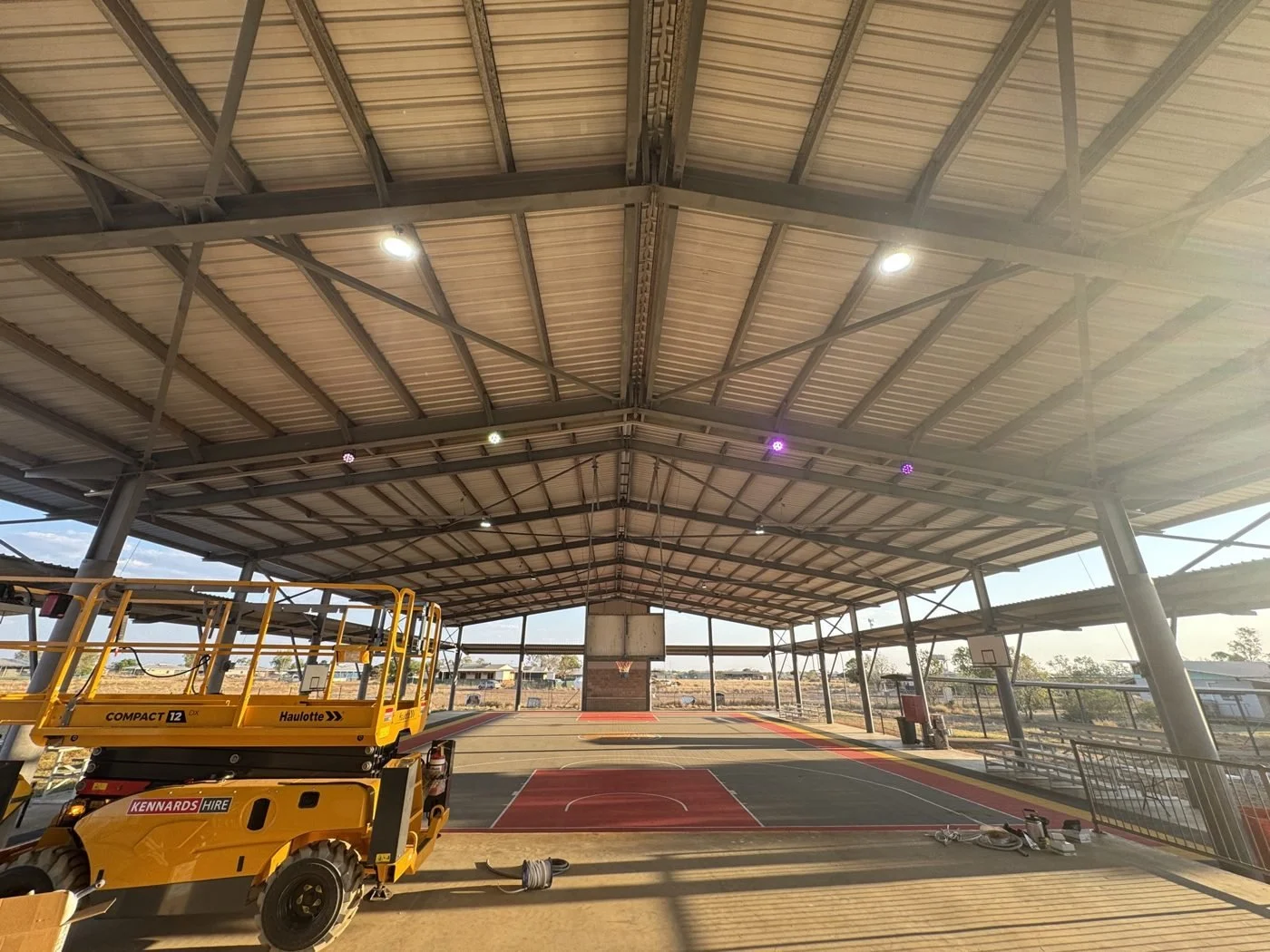 LED lighting installed over a remote community basketball court