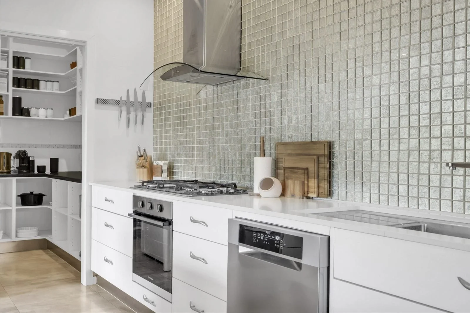Kitchen power, appliances and rangehood in a renovated home