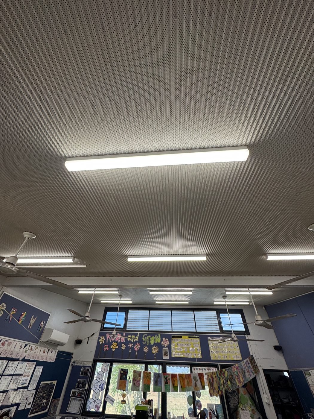 LED lighting under a perforated school ceiling