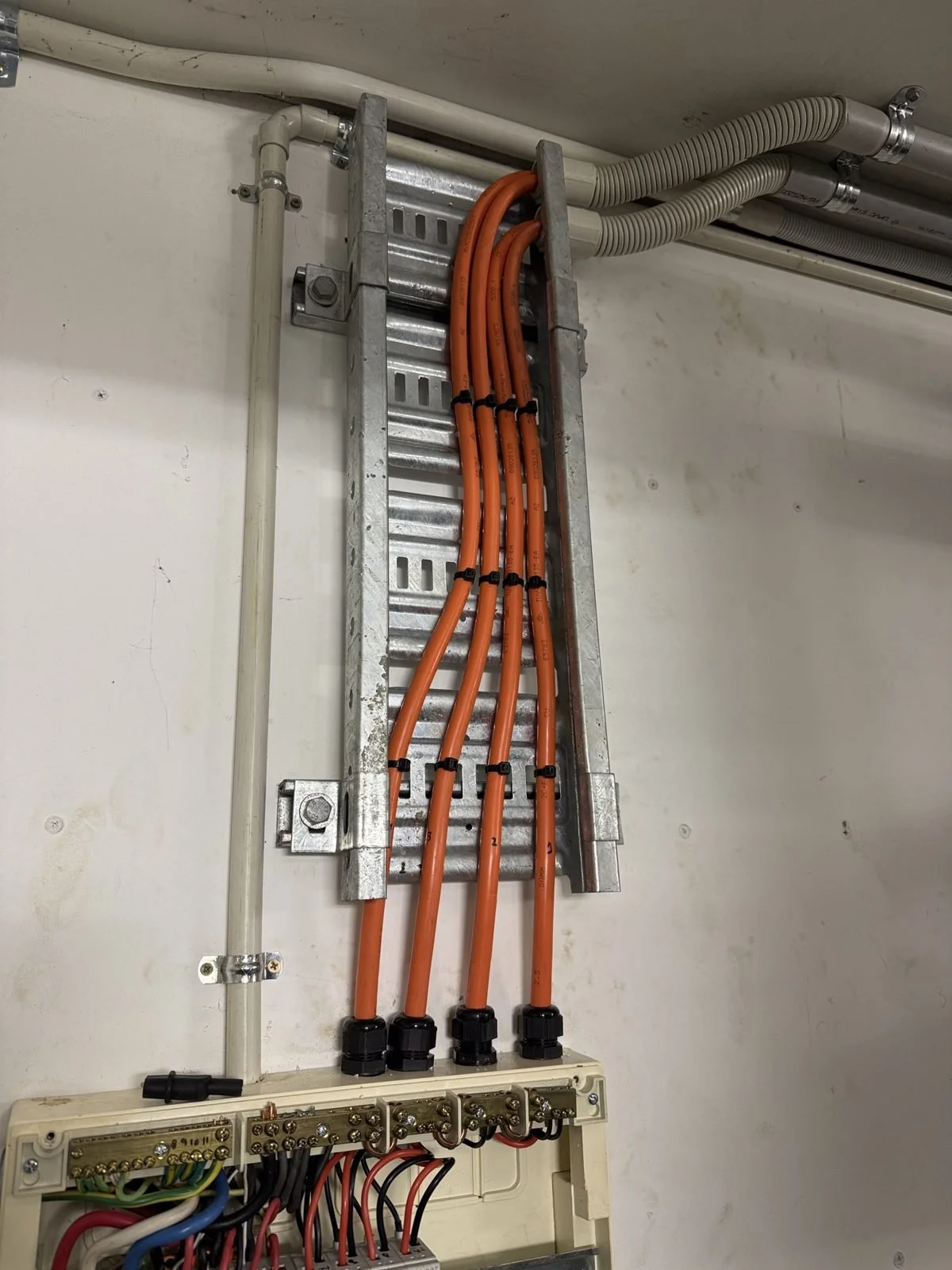 Neatly run sub-mains into a switchboard