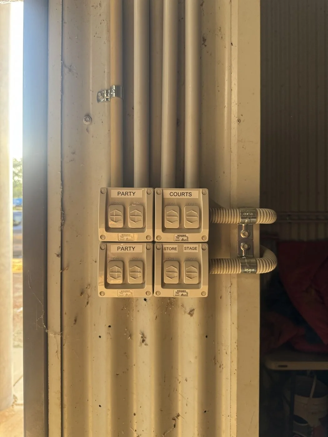 Labelled weatherproof switches for court and stage lighting