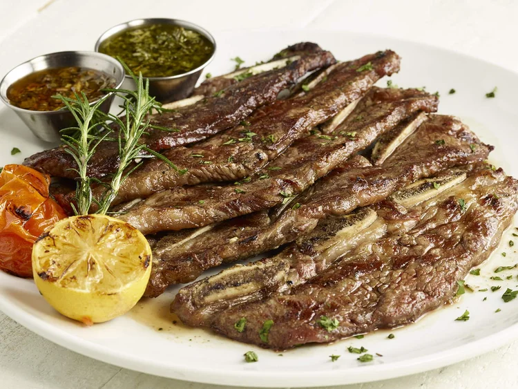 Argentine style short rib sliced across the bone, served with chimichurri and salsa criolla