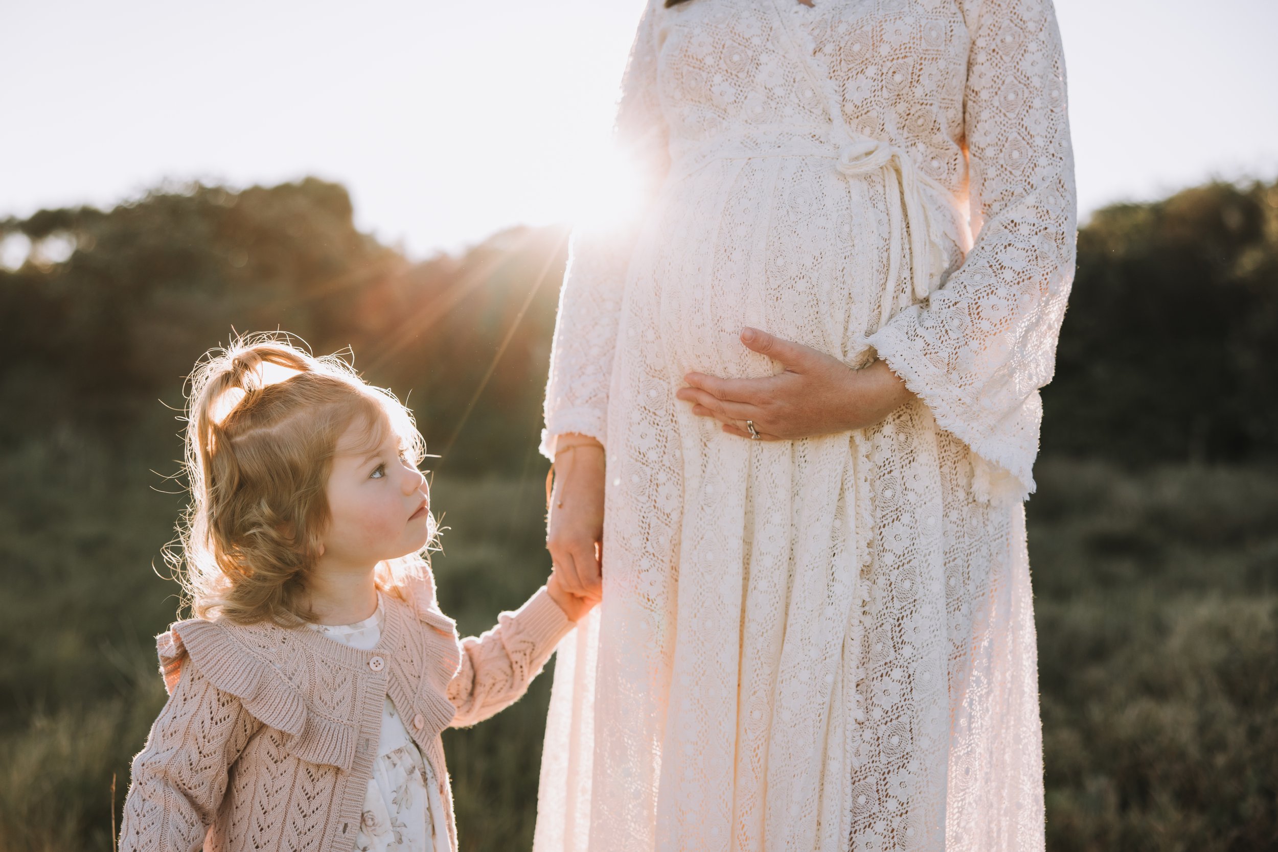 Mother and daughter maternity photo by Nicole Butler Photography