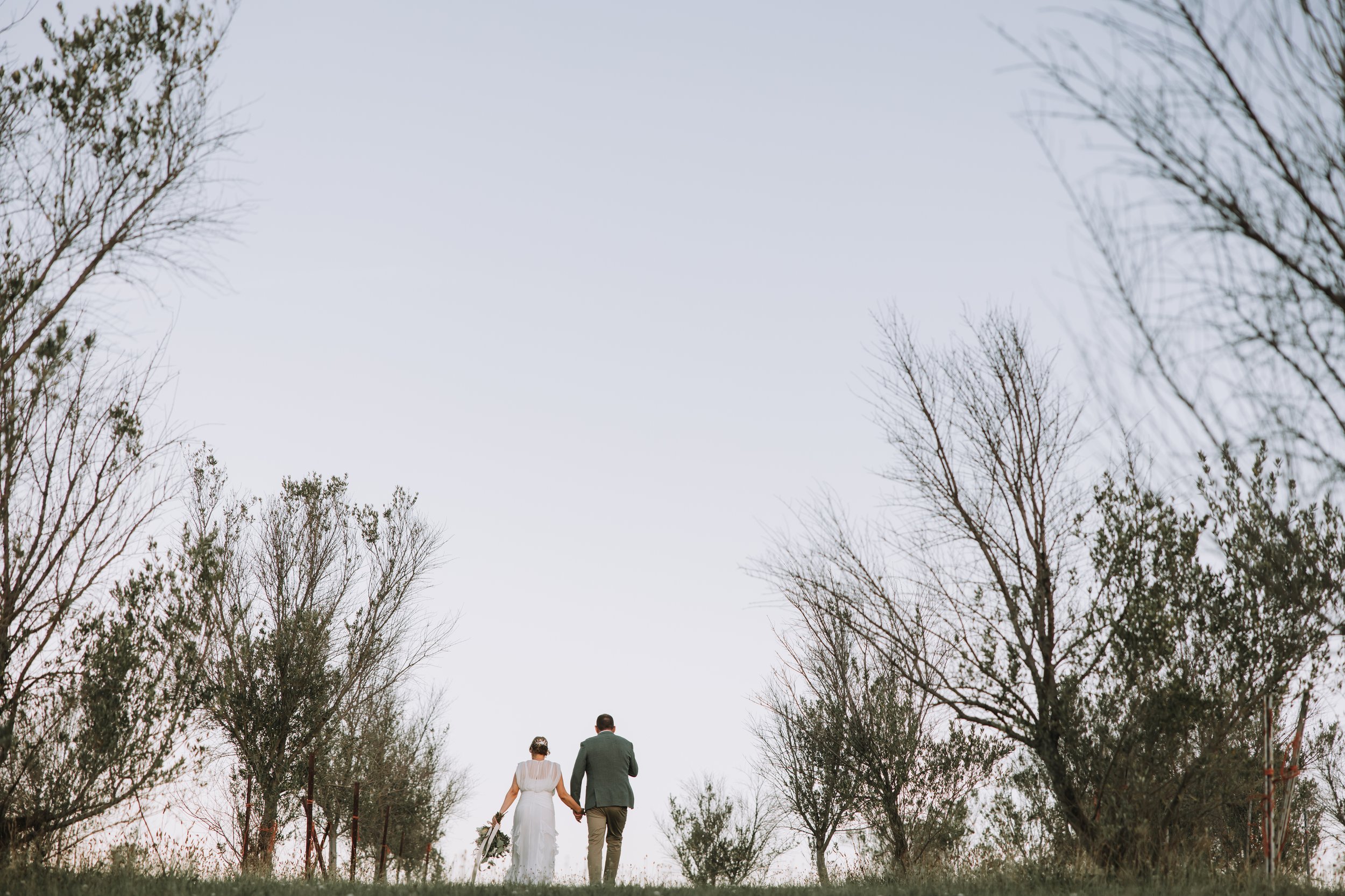 Soft pastel sky and wedding scenery – Lesa and Brad's special day by Nicole Butler Photography