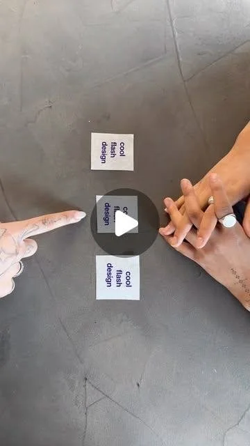 Hands placing flash stickers on skin