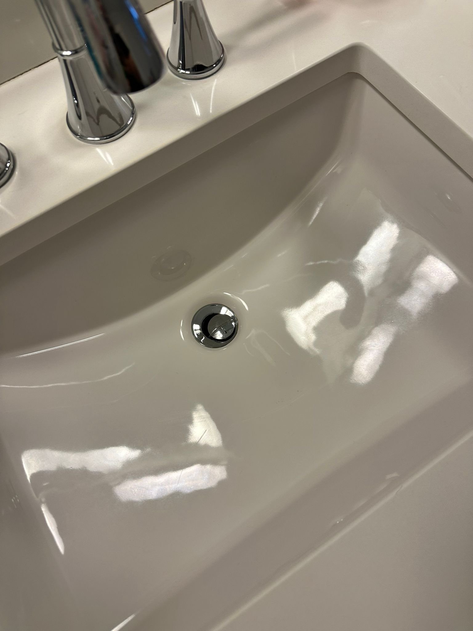 Clean bathroom sink after service