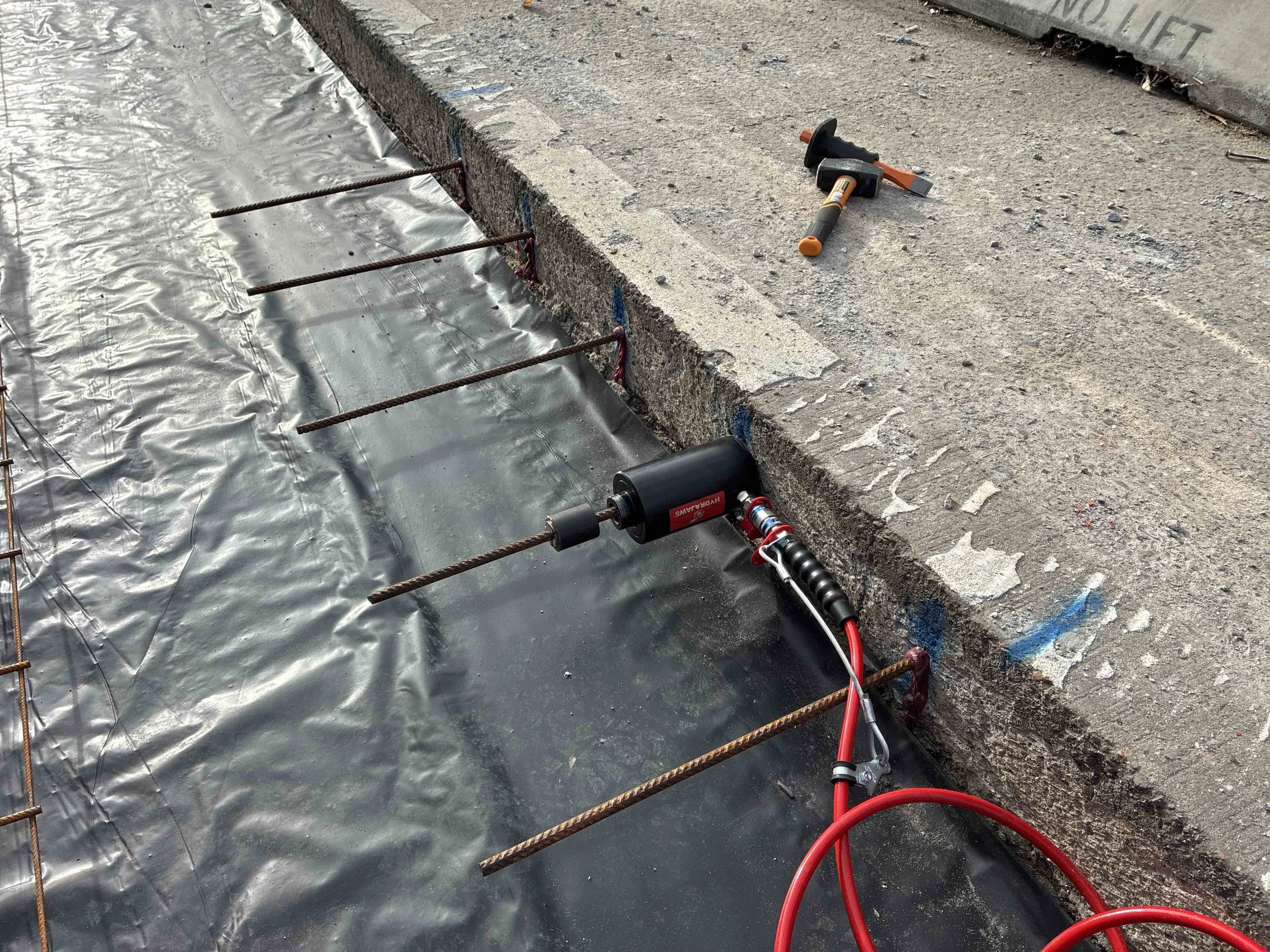 Post-installed rebar pull-test equipment on site