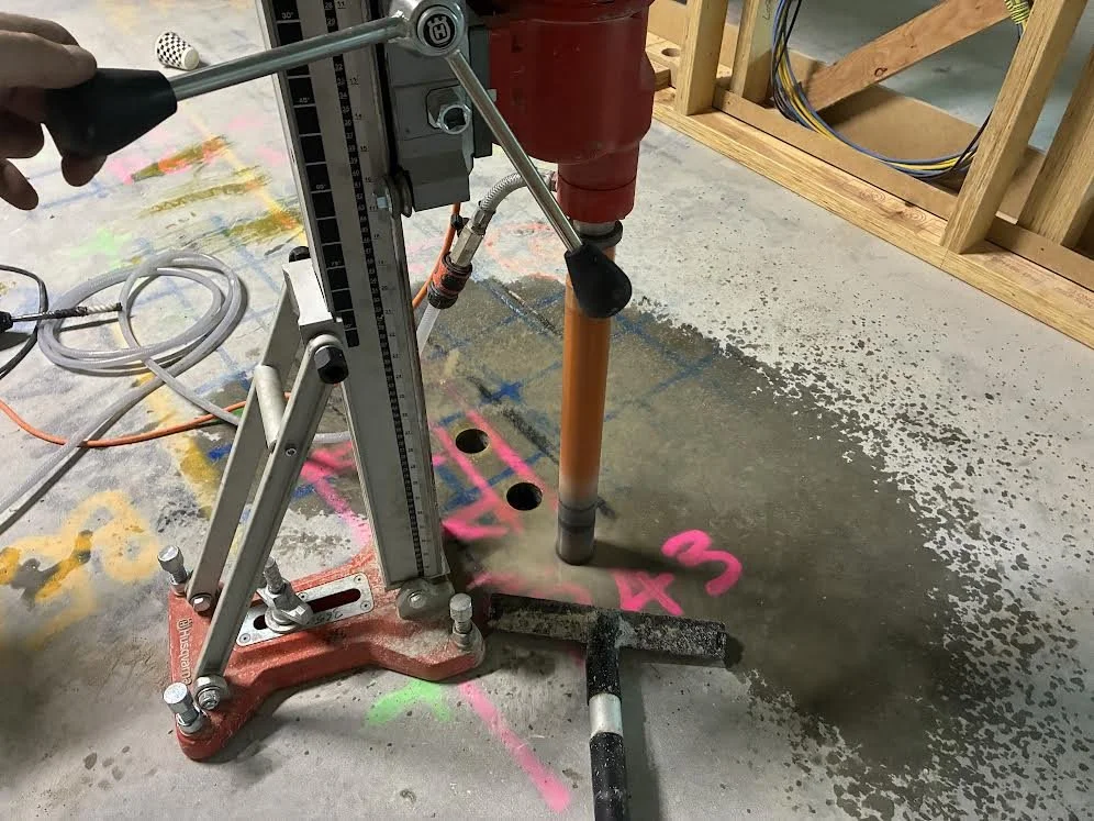 Core drilling through a concrete slab