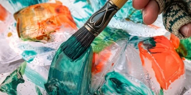 Child exploring Ice Cube painting
