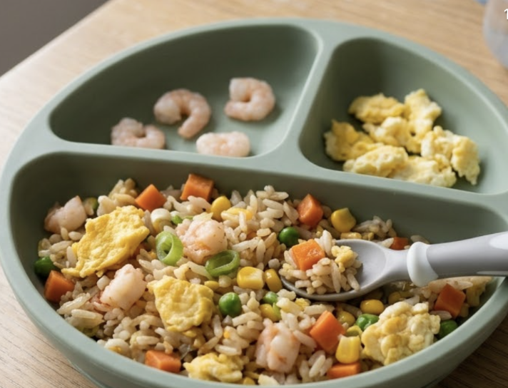 Prawn fried rice with visible vegetables in a bowl