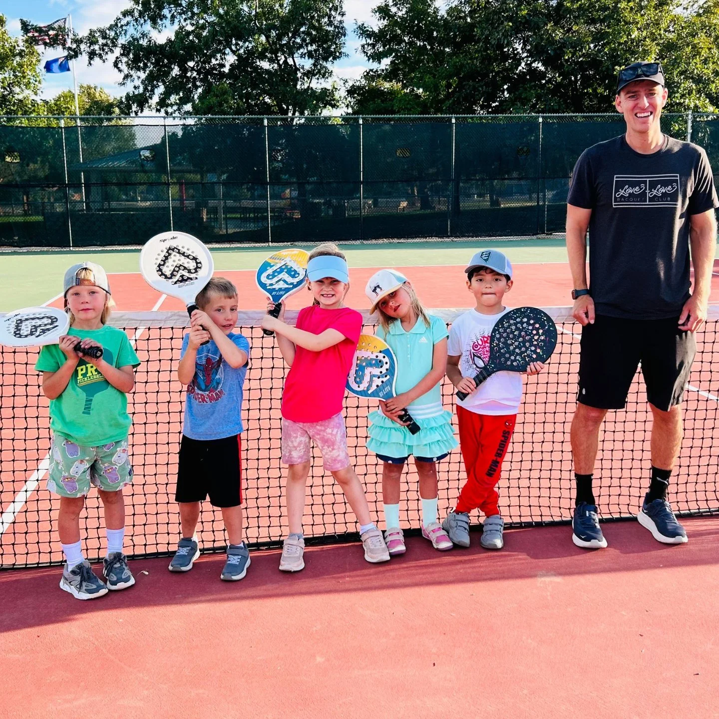 Kids at Love Love Racquet Club tennis camp