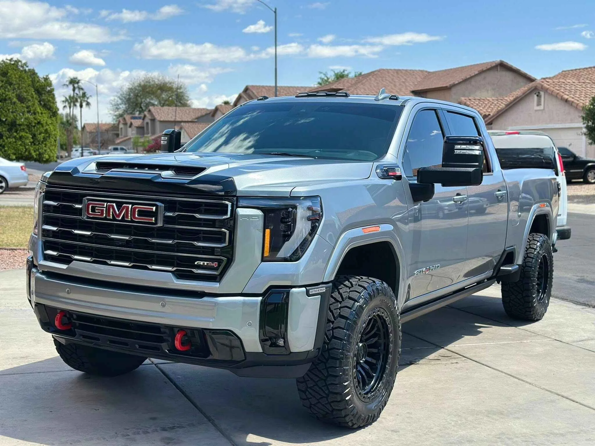 Close-up of ceramic coating water beading on luxury vehicle paint