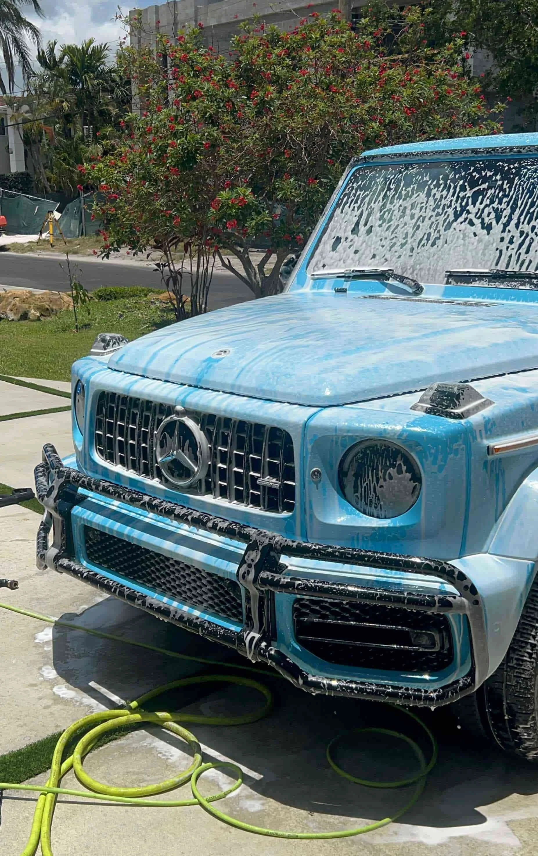 Hydrophobic water beading on freshly waxed car Miami