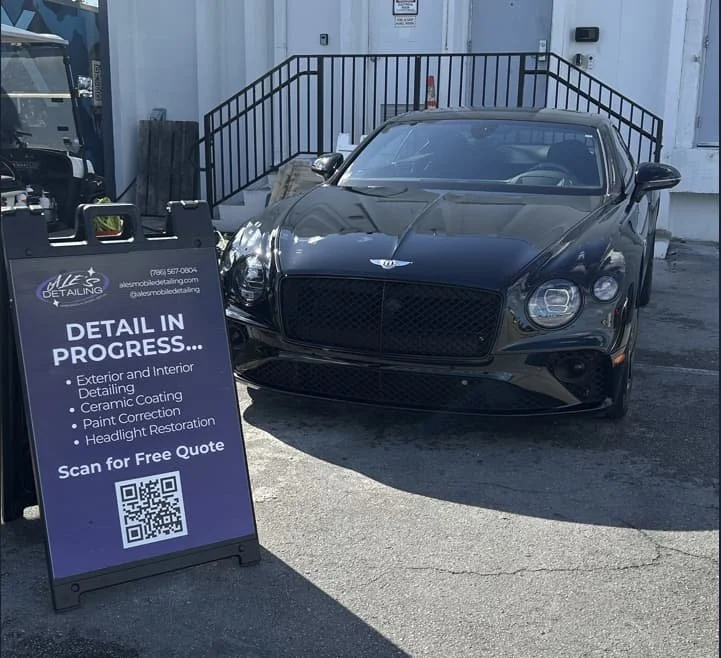 Paint correction and 1-year ceramic coating on a black car by mobile detailer in Miami