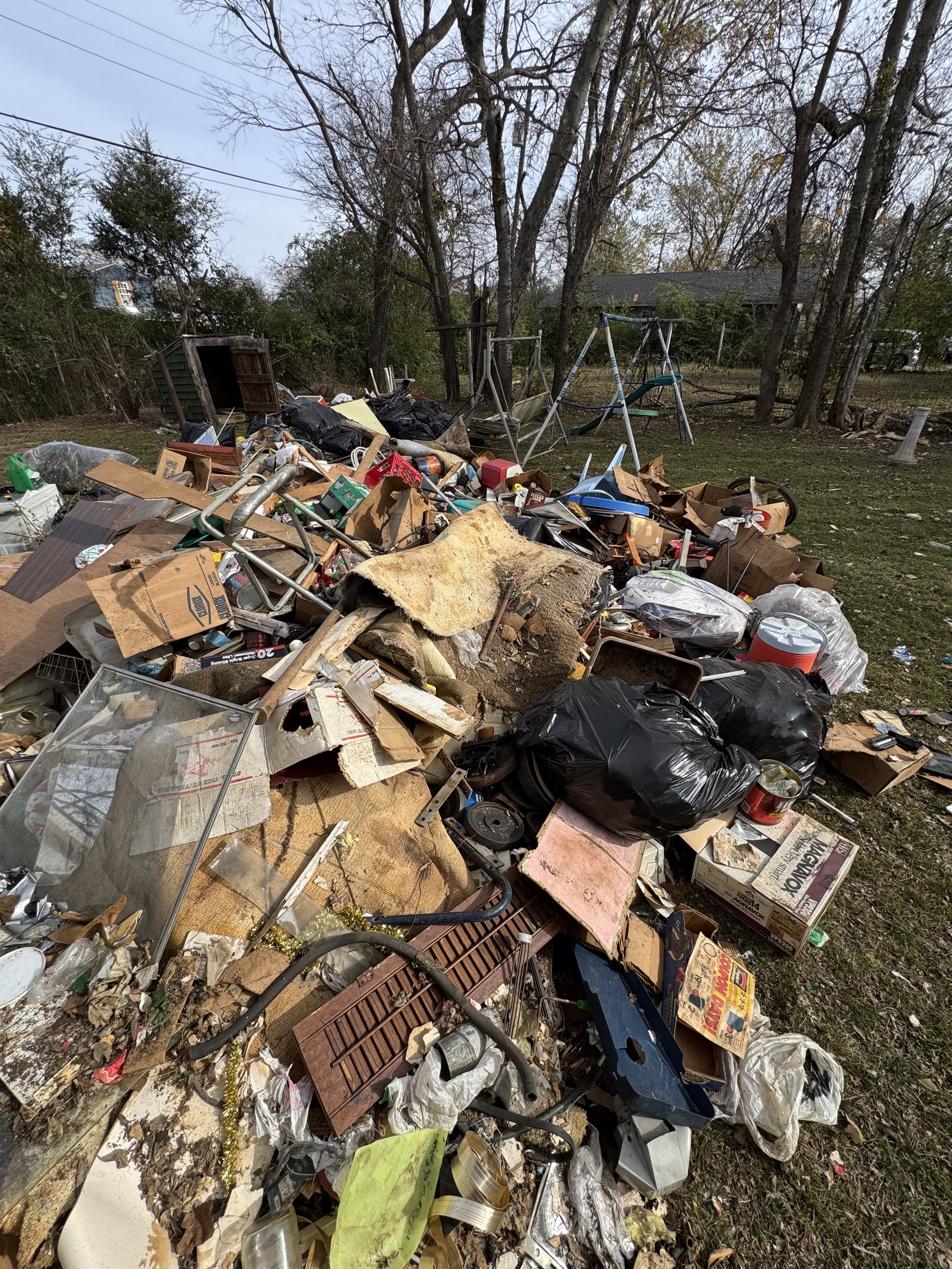 Estate cleanout service in progress - Cleanup Crew team working