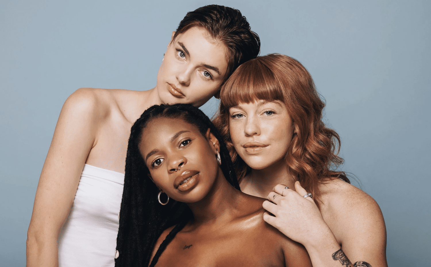 Three women with smooth, radiant skin at Stella Dieci Spa