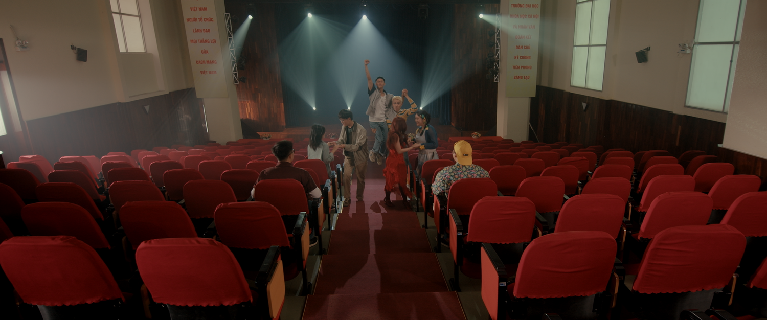 A Little Dream of Me: a cinema of red seats facing a lit stage