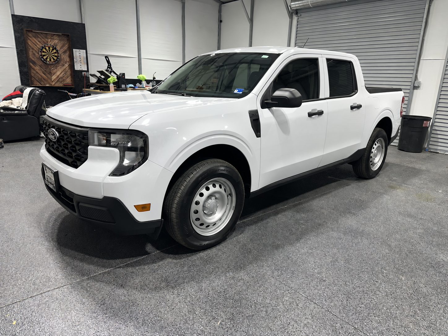 White Ford pickup before its commercial wrap